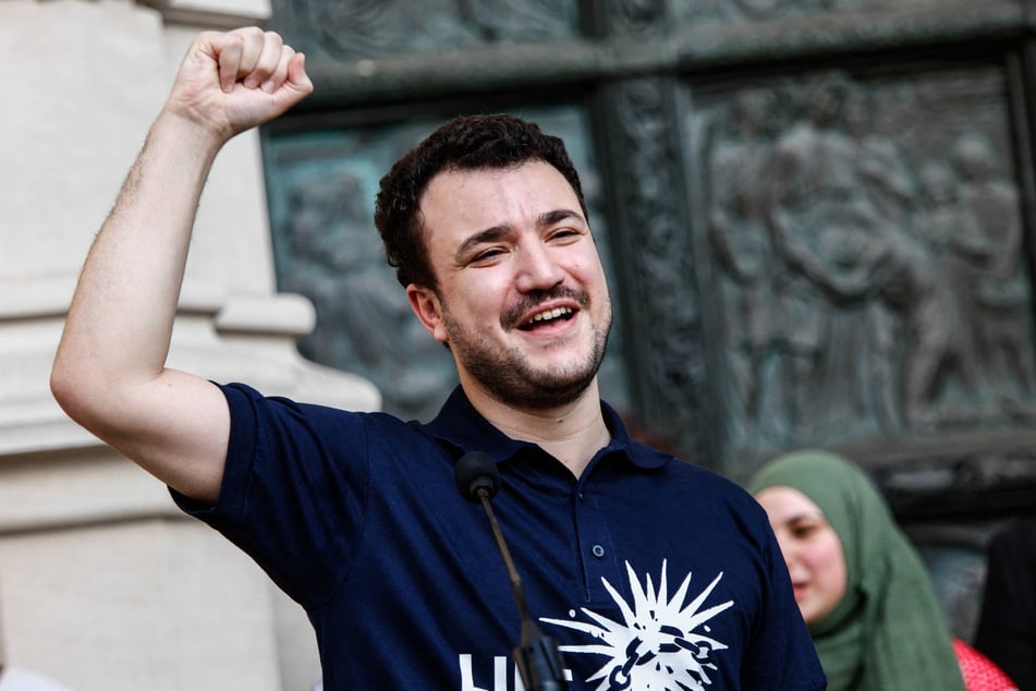 Former Columbia University student and Palestinian rights activist Mahmoud Khalil speaks at a press conference following his release from ICE detention outside the Cathedral of St. John the Divine in New York City on June 22, 2025.