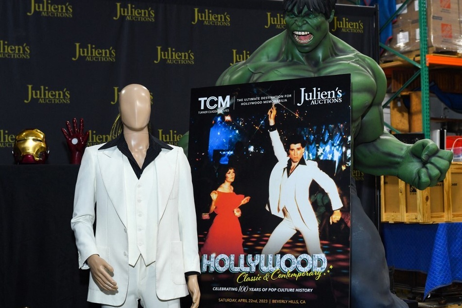 The custom-made white suit worn by John Travolta in Saturday Night Fever is displayed at Julien's Auctions.