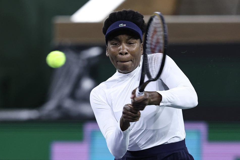 Venus Williams of the US returns a shot during her match against Nao Hibino of Japan during Day 4 of the BNP Paribas Open 2024 at Indian Wells Tennis Garden on March 6, 2024.