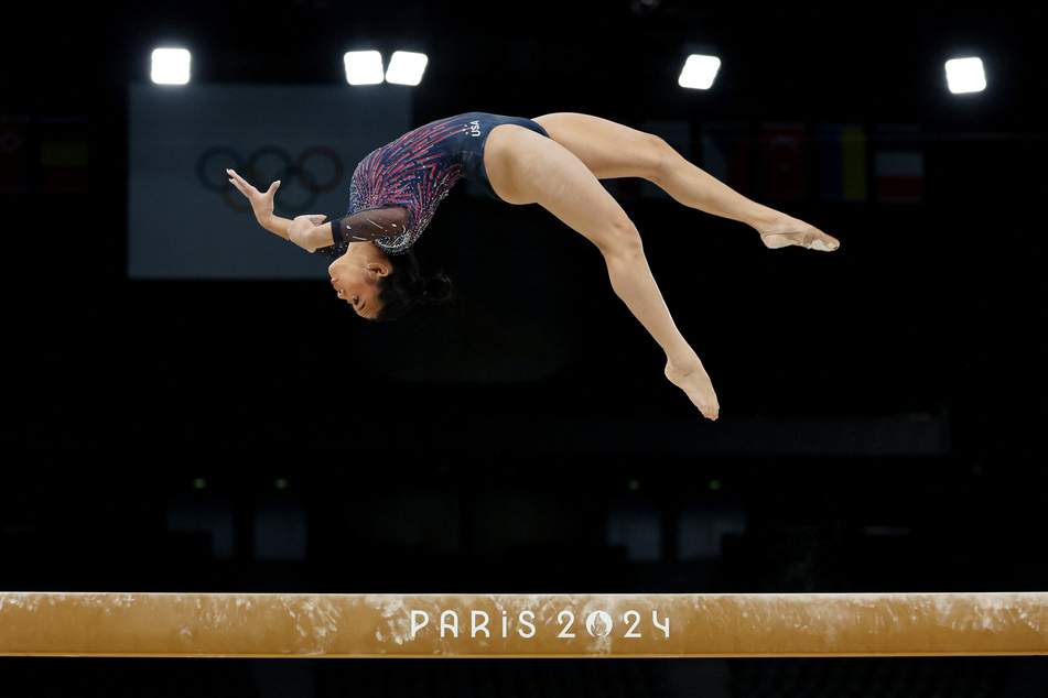 Suni Lee trains on balance beam at Bercy Arena ahead of the 2024 Paris Olympics.