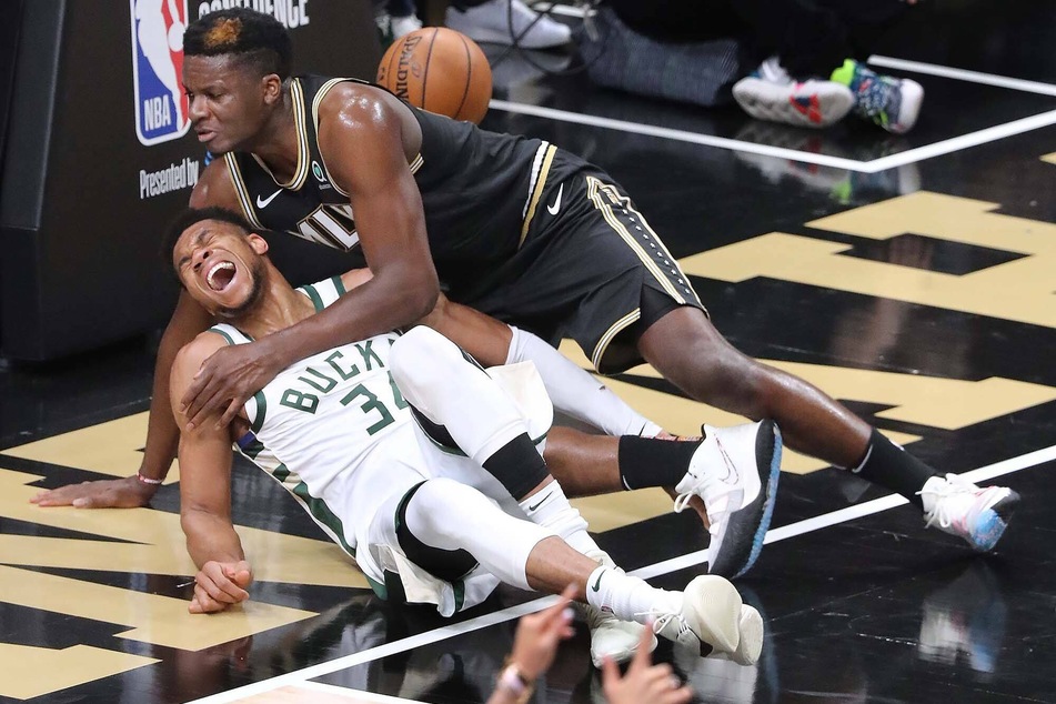 Bucks star Giannis (3) Antetokounmpo left the game with an injury during the third quarter.