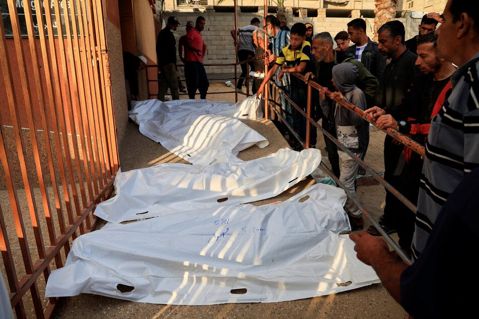 Israeli forces have repeatedly opened fire on Palestinians gathering to receive aid at Gaza Humanitarian Foundation center, killing scores.