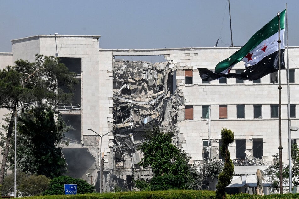 A picture shows a view of the damage following Israeli strikes on the Syrian army and defence ministry headquarters in Damascus on Wednesday.