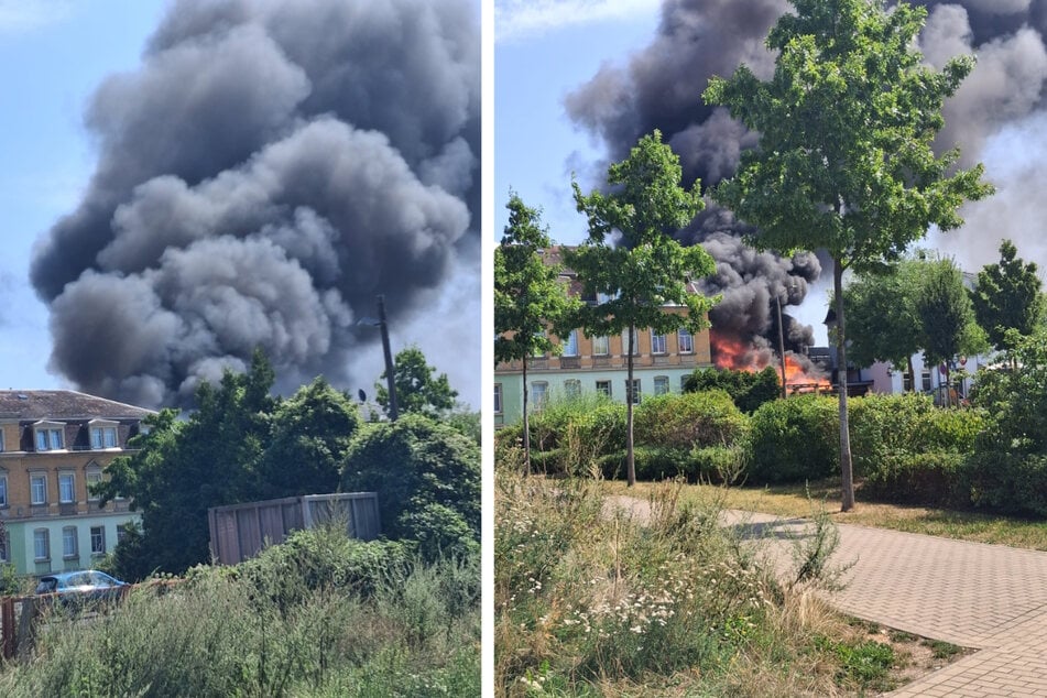 Dichter schwarzer Rauch stieg am Himmel über Dresden auf.