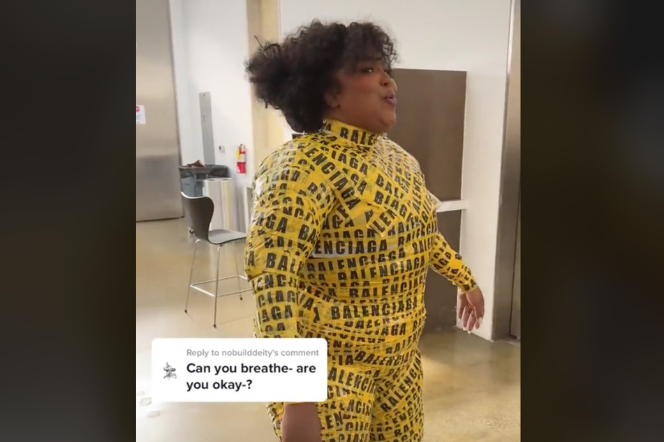 Lizzo waddles around in her cover outfit in a follow-up TikTok video.