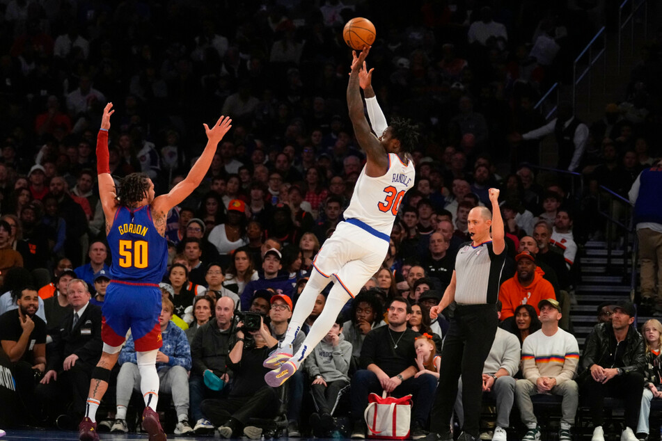 New York Knicks power forward Julius Randle (c.) made a jump shot against the Denver Nuggets during the first half of the game at Madison Square Garden on Saturday night.