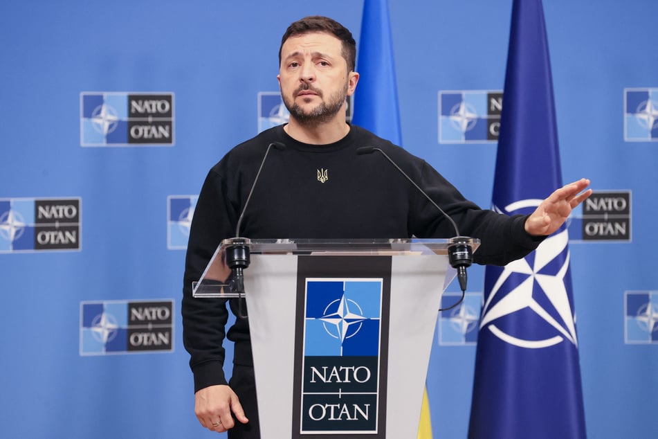 Ukraine's President Volodymyr Zelensky addresses the media during a press conference with NATO Secretary General at the NATO headquarters in Brussels, on October 17, 2024.