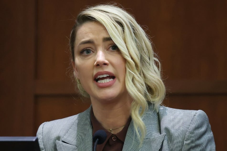 Amber Heard emotionally recounted the many threats she's received online since the start of the trial.