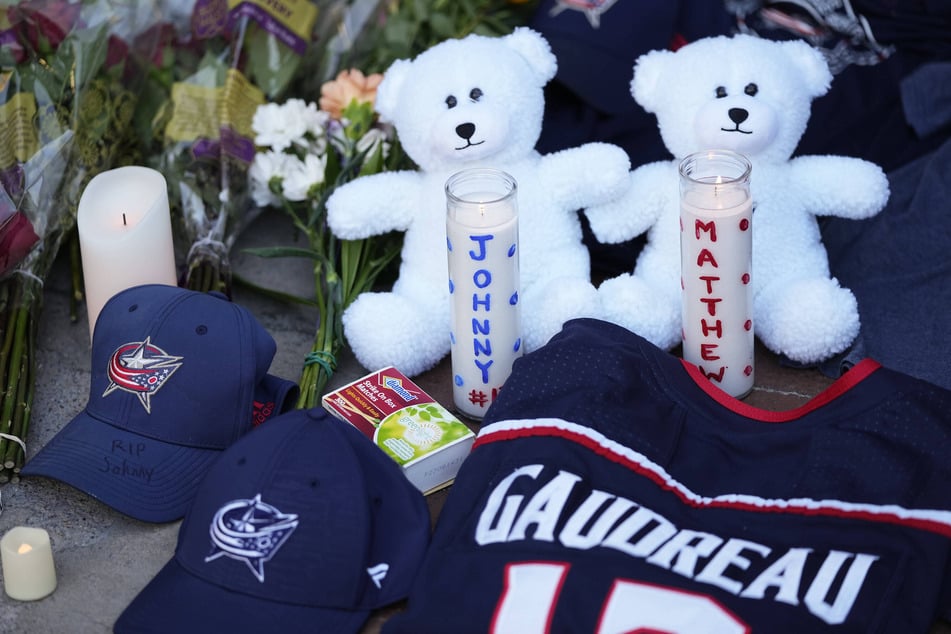 Fans left tributes to Johnny and Matthew outside of the arena.