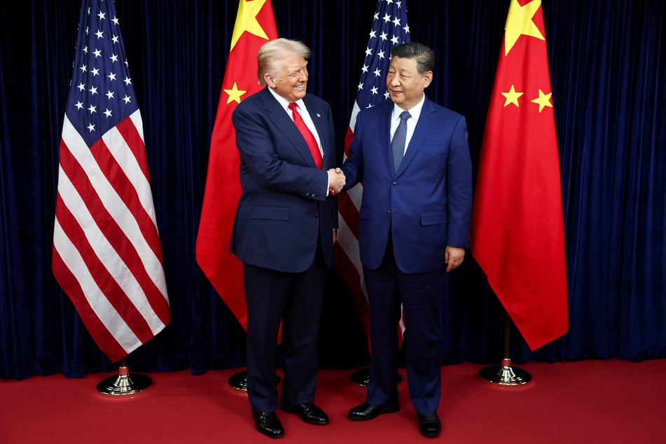 US President Donald Trump (l.) hailed his meeting with Chinese counterpart Xi Jinping as a "great success" and announced a raft of new deals with Beijing.