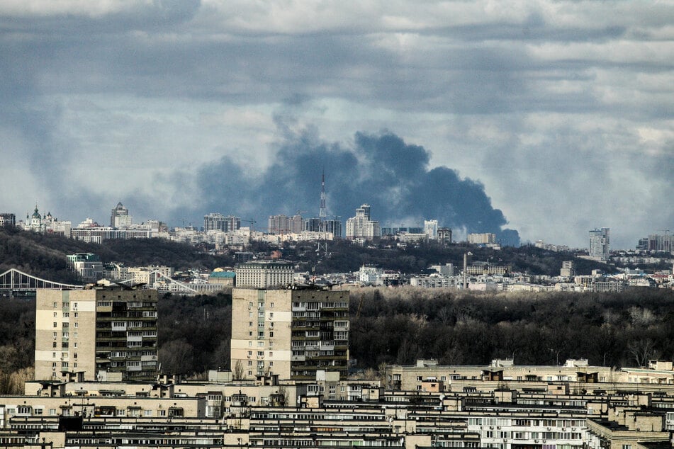 Smoke rises over Kyiv on Sunday as fighting continues around the city.