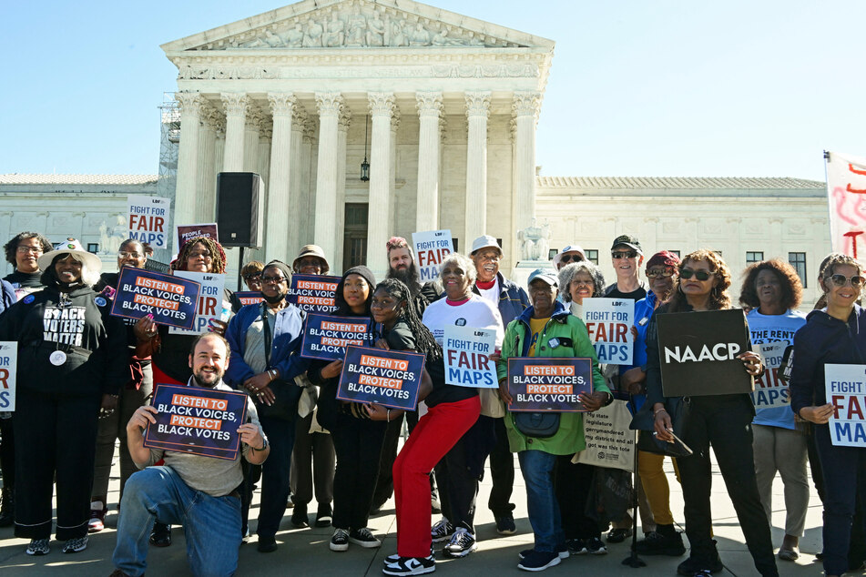 South Carolina voters attend a rally outside of the Supreme Court on October 11, 2023 in Washington, DC. South Carolina voters and Civil Rights are calling on SCOTUS to protect Black voters in the Alexander v. SC State Conference of the NAACP court case.