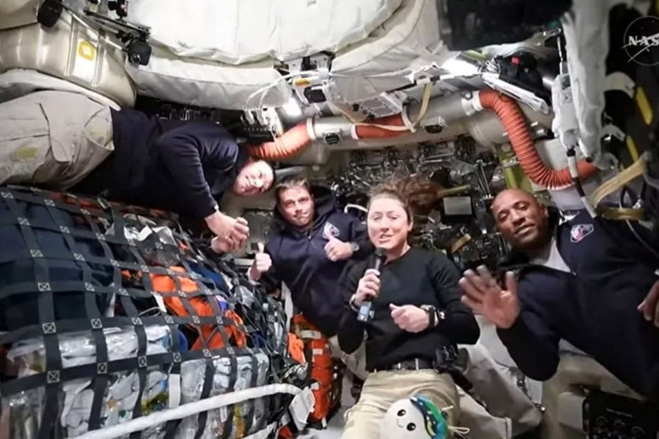 NASA Artemis II crew members Jeremy Hansen, Reid Wiseman, Christina Koch, and Victor Glover answer questions from reporters during the first downlink event of their mission on April 2, 2026.