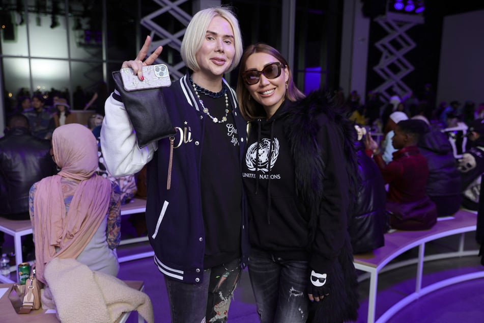 Oli London and Aliia Roza attend the Asia Fashion Collection fashion show during New York Fashion Week in February 2022.