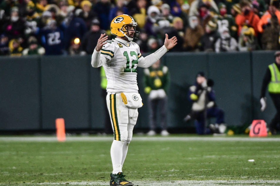 Green Bay Packers quarterback Aaron Rodgers reacts after throwing an incomplete pass on fourth down late in the fourth quarter against the Tennessee Titans at Lambeau Field.