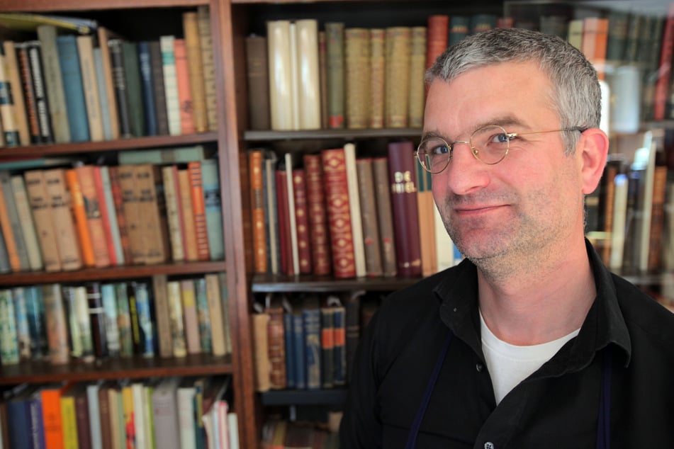 Michael Solder ist froh, dass sein Antiquariat bestehen bleibt, weil es nicht nur seine Existenz ist, sondern auch ein "wahnsinnig wichtiger Ort für Münster".