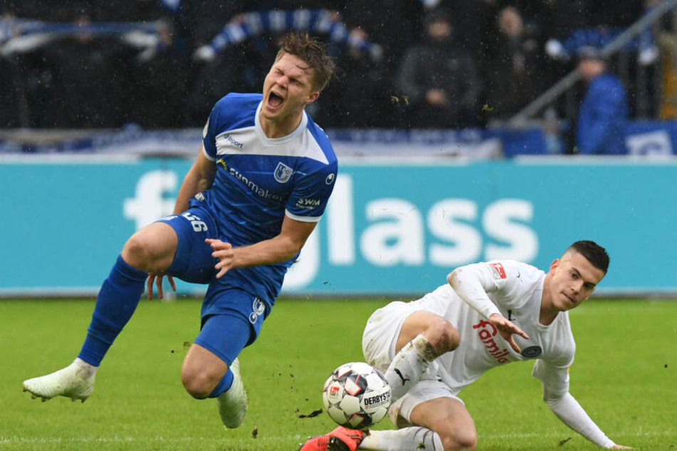 Magdeburgs Marius Bülter (l.) will unbedingt nach Berlin wechseln.
