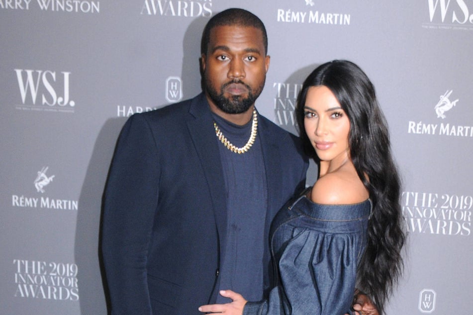 Kim Kardashian (r.) and Kanye West (l.) reunited for their daughter North West's Lion King performance at the Hollywood Bowl.