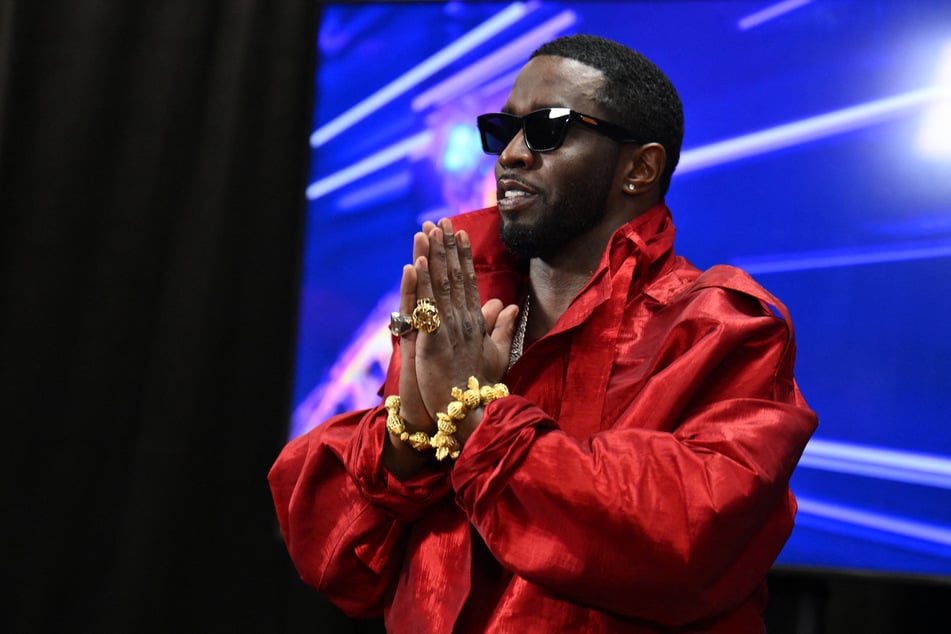 Sean "Diddy" Combs gestures in the press room during the MTV Video Music Awards at the Prudential Center in Newark, New Jersey, on September 12, 2023