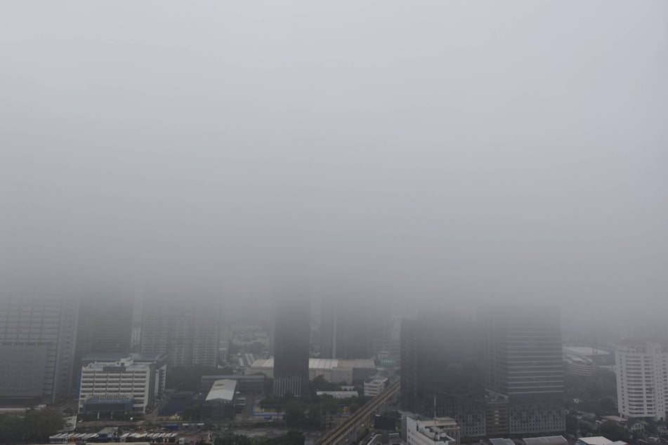 Heavy fog surrounds buildings in Bangkok, Thailand, under the influence of El Niño.