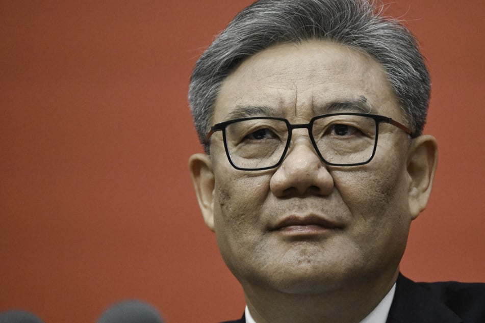 China commerce minister says Beijing and Washington can "totally find ways to resolve" disputes
