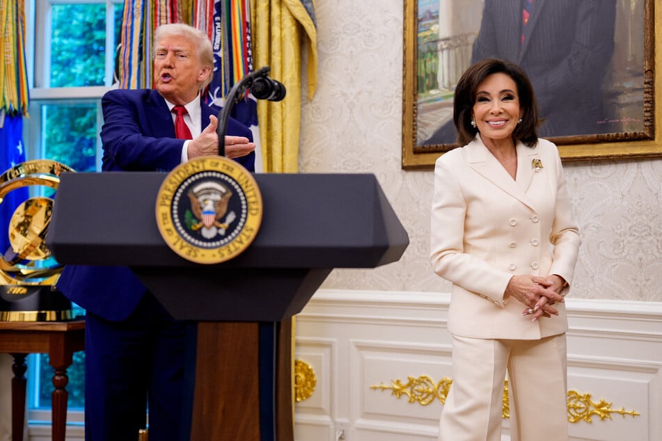 President Donald Trump (l.) speaks during a swearing-in ceremony for interim US Attorney for Washington, DC Jeanine Pirro (r.) in the Oval Office of the White House on May 28, 2025 in Washington, DC.