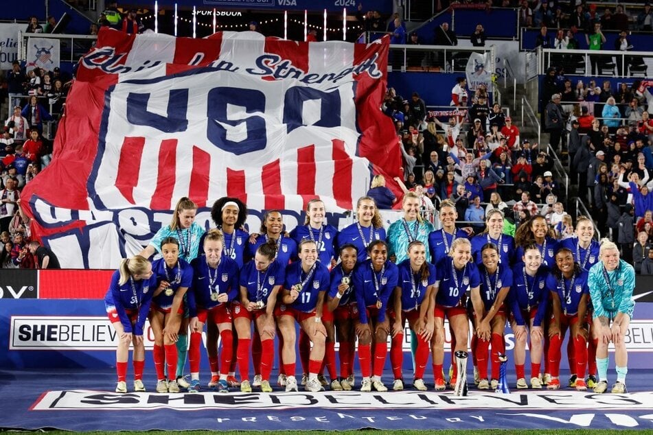 The US Women’s National Team celebrate their win after the SheBelieves Cup final soccer match against Canada in Columbus, Ohio, on April 9, 2024.