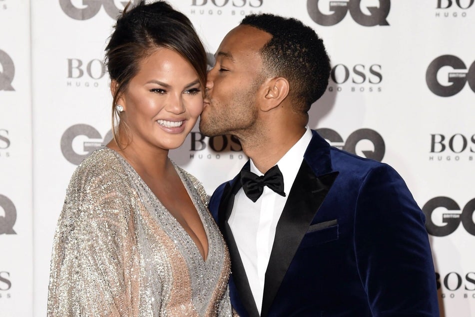 John Legend in tears as he sings for Chrissy and their unborn baby