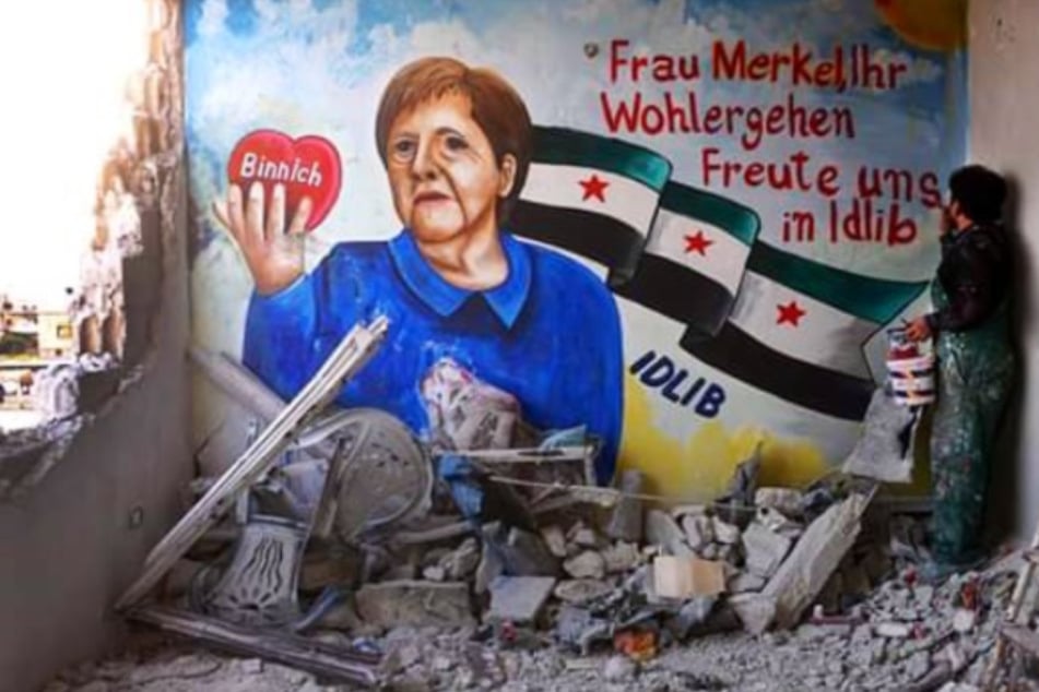Riesiges Merkel-Graffiti in Syrien: Künstler freuen sich über Corona-Testergebnis