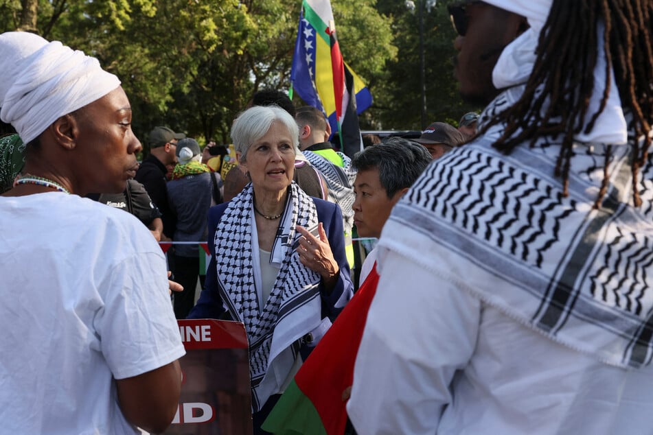 Dr. Jill Stein speaks with demonstrators during a protest calling for an end to US military aid to Israel outside the 2024 Democratic National Convention in Chicago, Illinois.