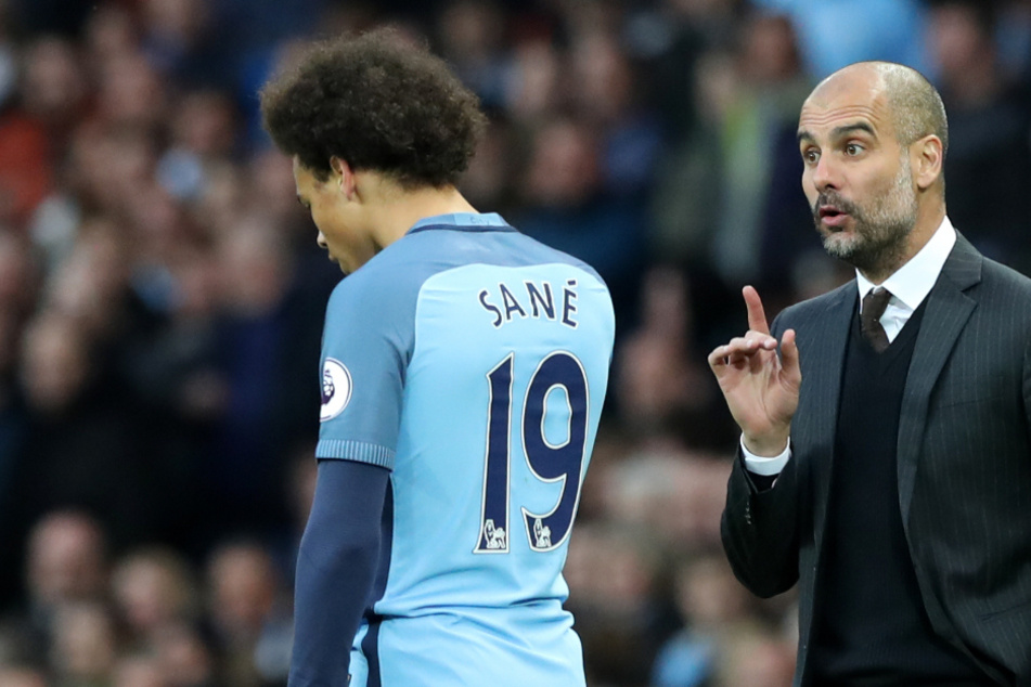 Nationalspieler Leroy Sané (24) und Cheftrainer Pep Guardiola (49).