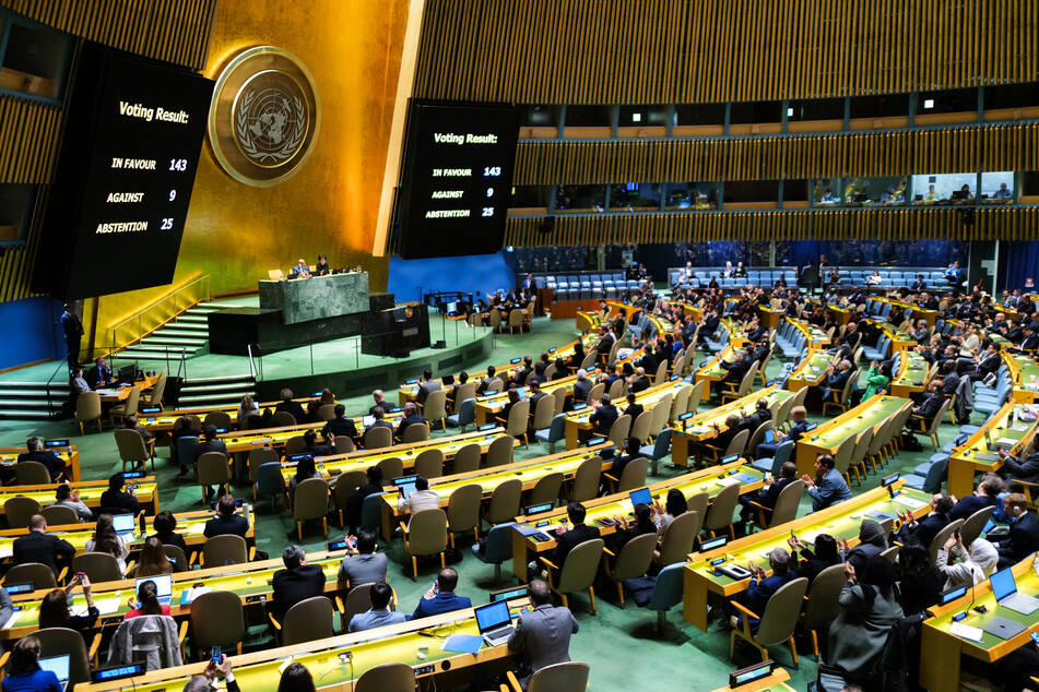 The results of a vote on a resolution for the UN Security Council to reconsider and support the full membership of Palestine into the United Nations is displayed during a special session of the UN General Assembly, at UN headquarters in New York City on Friday.