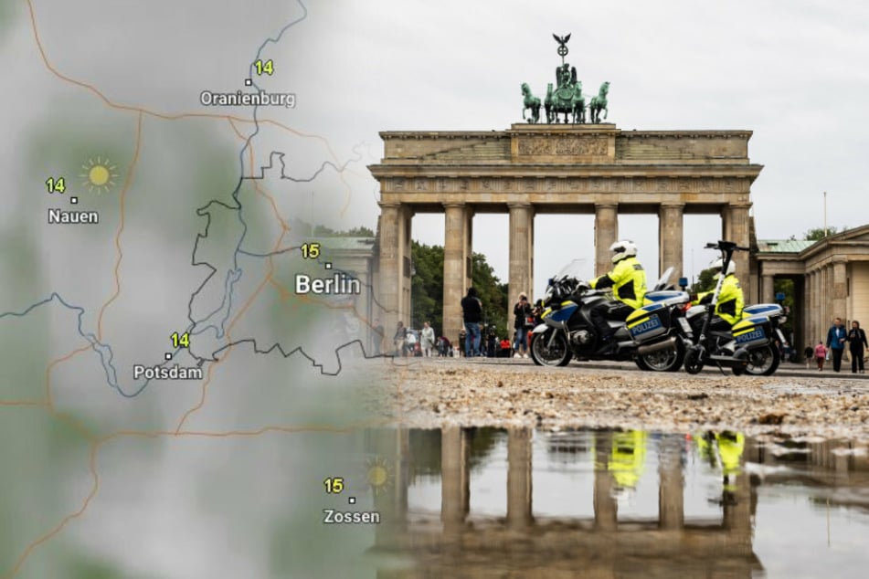 Polizisten auf Motorrädern fahren am Brandenburger Tor vorbei, das sich in einer Regenpfütze spiegelt.