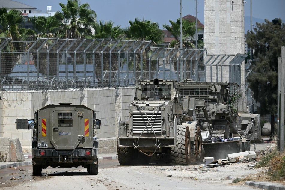 Armored vehicles and bulldozers were brought into Jenin to destroy roads and houses and block access to hospitals.