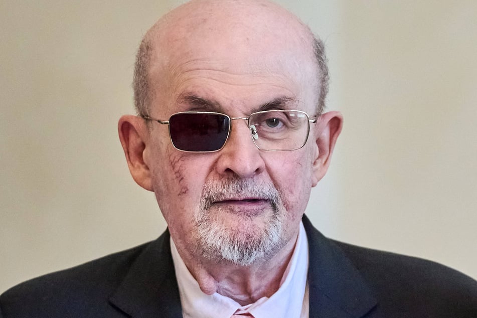 Novelist Salman Rushdie described Tuesday the moment a knife-wielding attacker stormed on stage and attempted to kill him in a frenzied attack that left him blind in one eye.