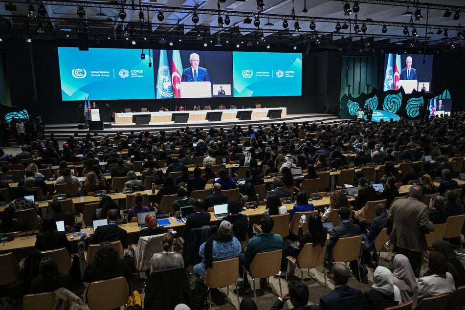 COP29 president Mukhtar Babayev delivers a speech during the opening of the 2024 United Nations Climate Change Conference (COP29) in Baku on Monday.