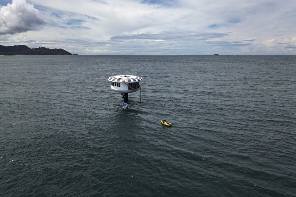 There are probably easier ways to set a world record, but Rudiger Koch has found his method 36 feet under the sea in a submerged capsule off the coast of Panama.