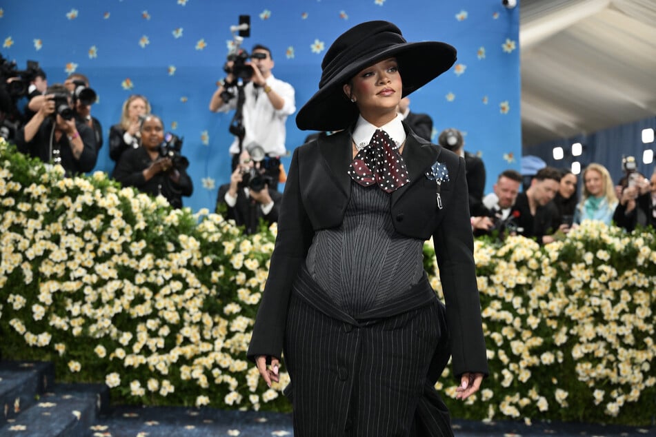 Rihanna revealed her third pregnancy at the event, which was co-chaired by her partner A$AP Rocky.