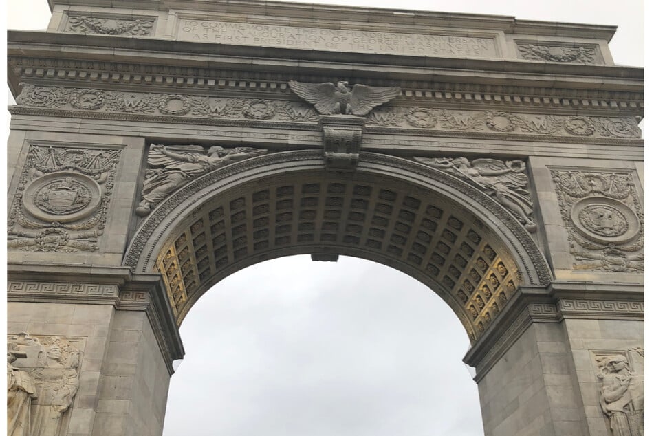 The famous Washington Square Arch was the scene of protests against a new park curfew on Saturday night.