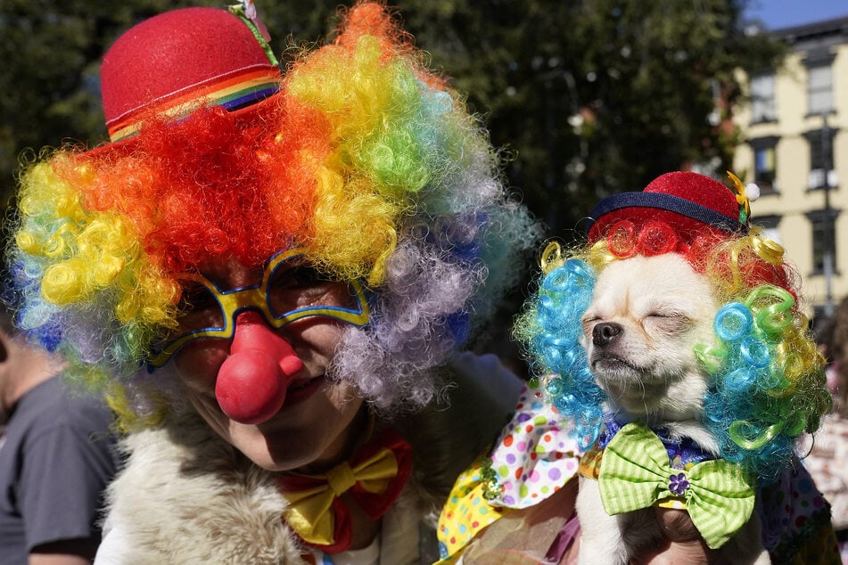 Dogs and their owners compete in the 32nd Tompkins Square Halloween Dog Parade on October 22, 2022, at Tompkins Square in New York City.