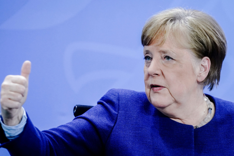 Kanzlerin Merkel (65, CDU).