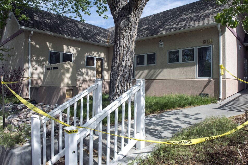 Police tape surrounds the site of a women's health and abortion clinic in Casper, Wyoming, which was the target of suspected arson and vandalism last year.