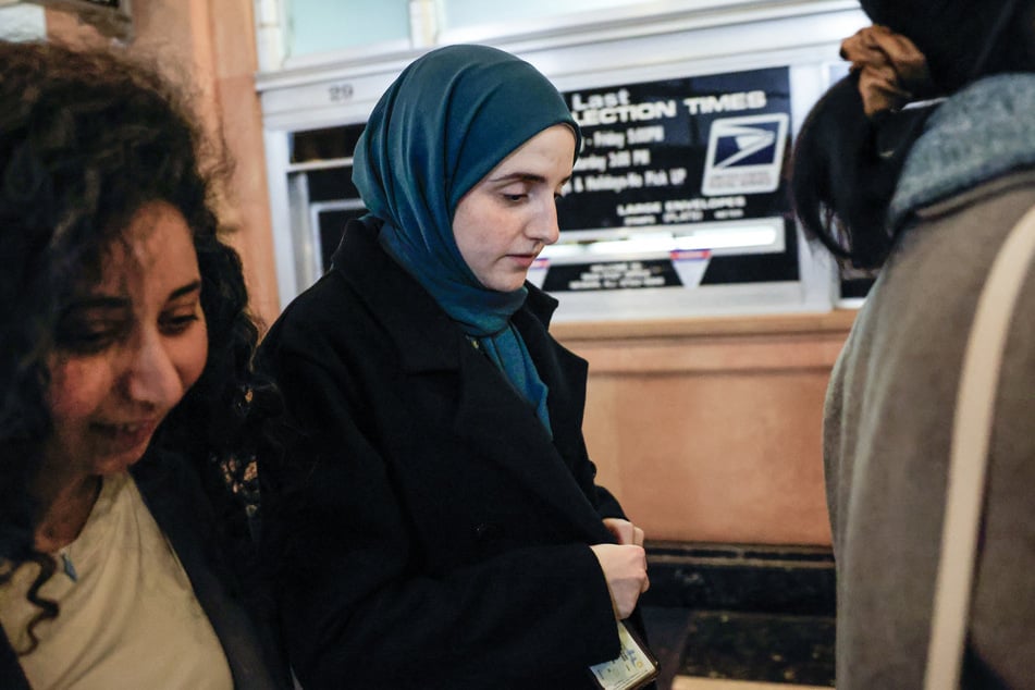 Mahmoud Khalil's wife Dr. Noor Abdalla (c.) leaves after a hearing in court in Newark, New Jersey, on March 28, 2025.