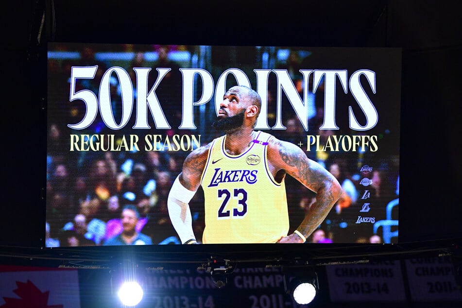 A video board displays the 50,000 career point milestone for Los Angeles Lakers forward LeBron James after he sank a three-point basket against the New Orleans Pelicans during the first half at Crypto.com Arena.