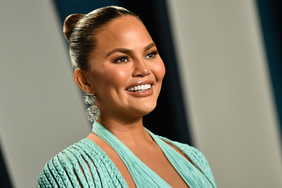 Chrissy Teigen feels honored to be among the 12 accounts Joe Biden follows on Twitter.