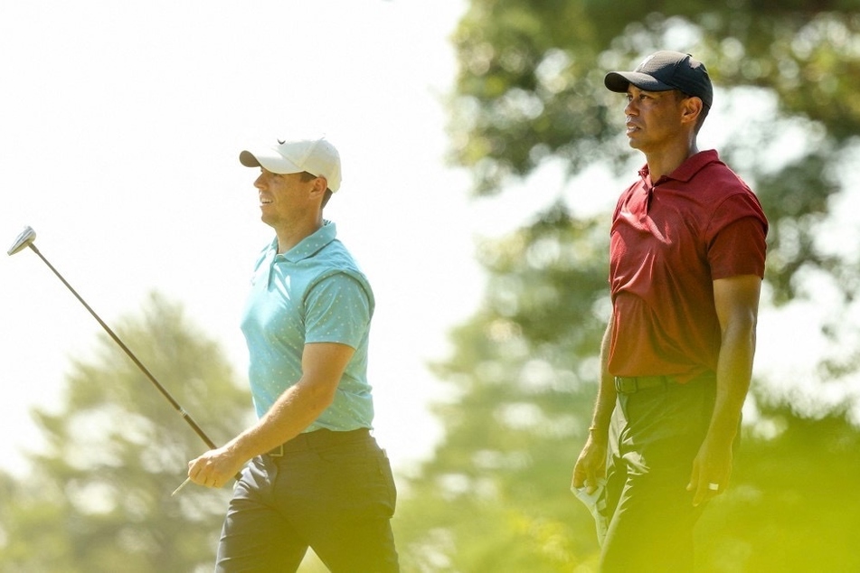 Champion golfers Tiger Woods (r.) and Rory McIlroy have teamed up with the PGA to create a new virtual-based golf league, the TGL.