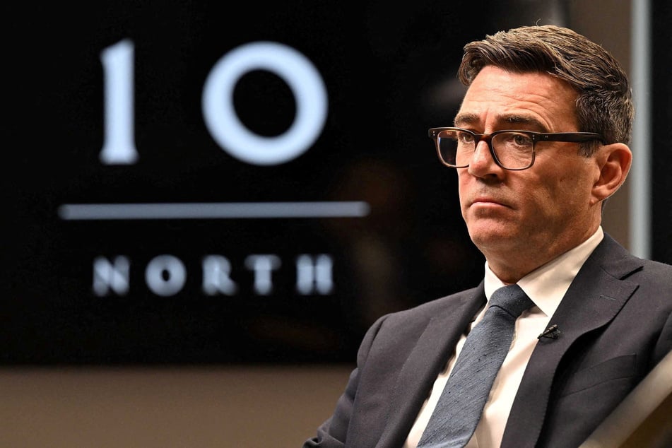 Britain's Prime Minister Andy Burnham attends an interview with BBC journalist Laura Kuenssberg in Manchester on July 24, 2026.