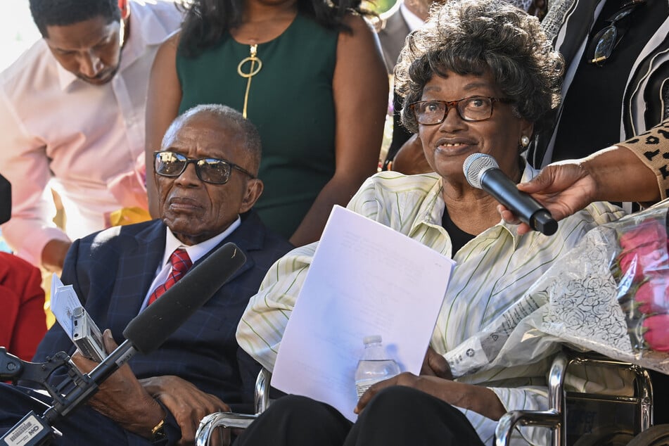 Claudette Colvin (r.) speaks next to civil rights attorney Fred Gray during a press conference after she petitioned for her juvenile record to be expunged at the Montgomery County Family Court on October 26, 2021.