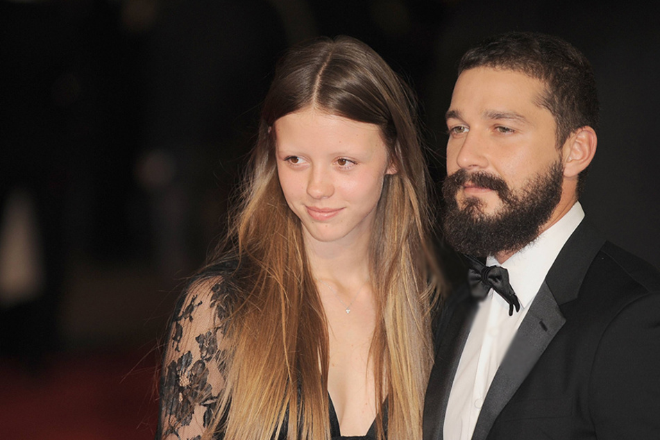 Shia LaBeouf (r.) is reportedly expecting his first child with his on-again, off-again flame Mia Goth (l.)