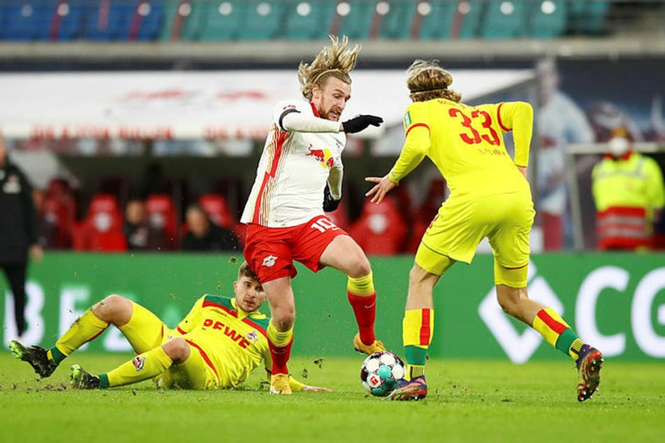 Leipzig's Emil Forsberg (center) also missed a good shot.